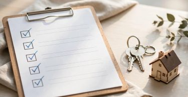 Complete home buying checklist — checklist, house keys and a new home