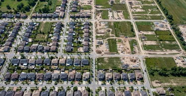 Aerial view of a residential area — understanding real estate market trends