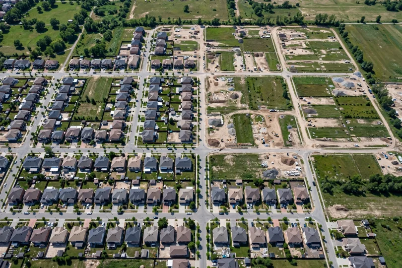 Aerial view of a residential area — understanding real estate market trends